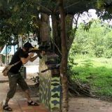 Chu Chi tunnels, Vietnam, Janne & AK 47: 