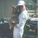 Minä ja porukoitteni koira Tellu joskus vuonna 2003.