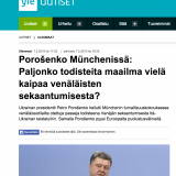 Yle nosti esiin suoraan Reutersin uutisen. Kuvakaappauksessa Ukrainan presidentti Petro Porošenko pitää kädessään venäläisiä passeja.